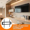 A modern kitchen with a TV mounted on the wall, and a product image of a TV wall mount in the foreground. Produktbild-Vorschau