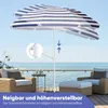 A striped beach umbrella is set up on a wooden deck overlooking the ocean, with two chairs and a small table. Produktbild-Vorschau
