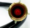 Close-up of the end of a black hose with a brass fitting that has a red light visible inside. Produktbild-Vorschau