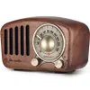 A vintage-style radio with a wooden casing and a classic dial. Produktbild-Vorschau