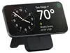 A black Satechi magnetic power bank with a phone attached, displaying a clock and weather information. Produktbild-Vorschau