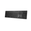 A black and gray wireless keyboard is shown from a slightly elevated, diagonal angle against a white background. Podgląd zdjęcia produktu