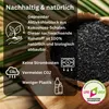 A close-up of activated charcoal from coconut shells, with informational text and icons. Produktbild-Vorschau