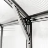 A close-up view of the internal structure of a greenhouse, showing a metal support bracket and translucent polycarbonate panels. Produktbild-Vorschau