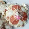 Mobile décoratif en forme de coquillage, fabriqué à la Voir les images du produit 4