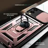 A close-up, angled view of a rose gold phone case with a built-in ring stand and a sliding camera cover. Produktbild-Vorschau