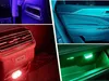 Collage of four images showing different car interior lighting effects in purple, blue, red, and green. Produktbild-Vorschau