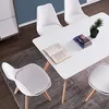 A dining set with chairs and a table in a room. Produktbild-Vorschau