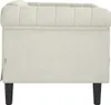 Side view of a cream-colored armchair. Produktbild-Vorschau