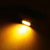 A close-up shot of a single amber LED light emitting a bright glow against a dark background. Podgląd zdjęcia produktu