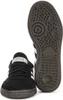 A pair of black Adidas Handball Spezial J sneakers, with one shoe shown from the front and the other from the sole. Voir les images du produit