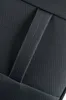 A close-up view of the textured fabric of a black bag with a stitched strap detail. Produktbild-Vorschau