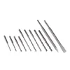 A set of drill bits and chisels arranged diagonally on a white background. Podgląd zdjęcia produktu