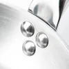 A close-up view of the rivets on a metal pan. Podgląd zdjęcia produktu