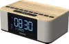 A digital clock radio with a wood-grain top and fabric speaker grilles. Anteprima dell’immagine prodotto