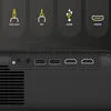 Close-up view of the input ports on a black projector, with icons and labels indicating the types of connections available. Voir les images du produit