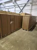 Cardboard boxes stacked on pallets in a warehouse. Produktbild-Vorschau