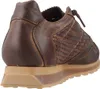 A close-up side view of a brown leather sneaker. Voir les images du produit