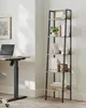 A modern home office setup with a standing desk and a ladder bookshelf. Produktbild-Vorschau
