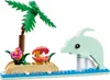 A LEGO set depicting a tropical scene with a dolphin, a palm tree, flowers, and a clam with a pearl. Náhled obrázku produktu