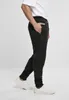 Pantaloni della tuta Starter Essential neri - L Anteprima dell’immagine prodotto 4