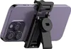 A close-up rear view of a smartphone attached to a black selfie stick/tripod. Anteprima dell’immagine prodotto