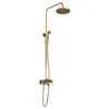 A gold-colored shower system with a rain shower head and a handheld shower head, shown against a white background. Podgląd zdjęcia produktu
