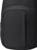 A close-up view of the front pocket of a black backpack. Podgląd zdjęcia produktu