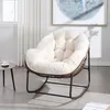 A comfortable rocking chair with a plush cushion is placed in a well-lit room with sheer curtains and a piece of art on the wall. Anteprima dell’immagine prodotto