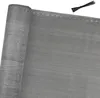 A rolled-up gray fence screen with zip ties on a white background. Produktbild-Vorschau