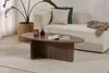 A living room scene with a couch, coffee table, and plant. Anteprima dell’immagine prodotto
