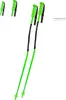A pair of green ski poles with black grips and straps, displayed against a white background. Smaller images of the grips are visible in the top left corner. Produktbild-Vorschau