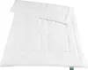 A white comforter laid out flat on a white background. Produktbild-Vorschau