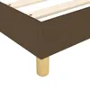 A close-up view of the corner of a boxspring bed frame, showing the brown fabric upholstery and a beige leg. Podgląd zdjęcia produktu