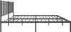 A side view of a black metal bed frame with a headboard. Náhled obrázku produktu