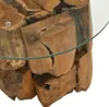 A close-up view of a rustic coffee table made from stacked pieces of teak driftwood, with a glass tabletop. Náhľad obrázku produktu
