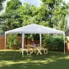A white party tent set up in a backyard with a wooden picnic table and benches underneath. Náhled obrázku produktu