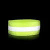 A reflective band with a white stripe on a black background. Náhled obrázku produktu
