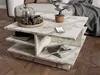 A marble coffee table with books, cups, and a teapot on it, placed in a living room setting. Náhľad obrázku produktu