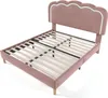 A pink upholstered bed frame with a slatted base, shown from a diagonal angle against a white background. Produktbild-Vorschau