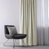A modern chair with a pillow sits next to a cream-colored curtain. Podgląd zdjęcia produktu