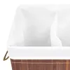 A close-up view of the interior of a brown bamboo laundry basket with a white fabric lining. Náhľad obrázku produktu