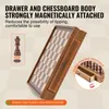 A wooden chess set with a drawer, showing its magnetic attachment feature. Anteprima dell’immagine prodotto