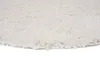 A close-up view of a white, shaggy rug. Voir les images du produit