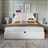 A bedroom scene with a bed, nightstands, and wall decor. Náhled obrázku produktu