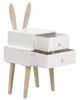 A white bedside table with wooden legs and rabbit ears. Náhľad obrázku produktu