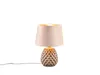 A table lamp with a textured ceramic base and a fabric shade, shown against a white background. Anteprima dell’immagine prodotto
