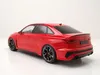 A red Audi RS3 model car is shown from a rear-quarter angle against a white background. Produktbild-Vorschau