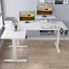 A white L-shaped standing desk with two monitors, a printer, a tablet, a keyboard, a mouse, and a drawer. Anteprima dell’immagine prodotto