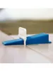 A close-up shot of a tile leveling system wedge and clip on a tiled floor. Náhľad obrázku produktu